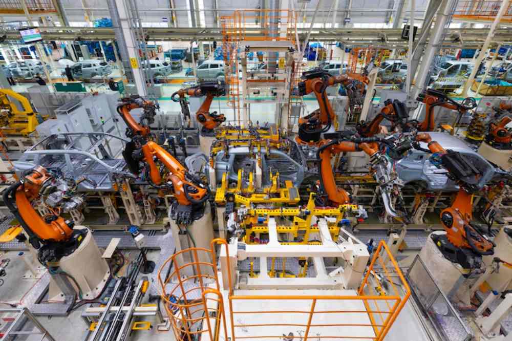 assembly-line-car-factory-welding-with-robots-automated-work_88135-31932